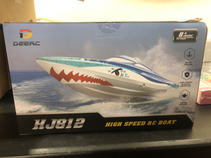 Photo 2 of DEERC Full Proportional Remote Control Boat with LED Lights, Shark Graffiti, 20+ MPH,2.4GHz High Speed RC Racing Boats for Lakes,Pool Toys for Kids & Adults