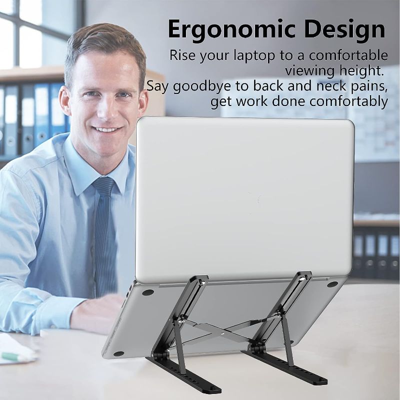 Photo 1 of Tonmom Laptop Stand for Desk, Adjustable Laptop Riser ABS+Silicone Foldable Portable Laptop Holder, Ventilated Cooling Notebook Stand for 10-15.6” Laptops,Tablet-Black 