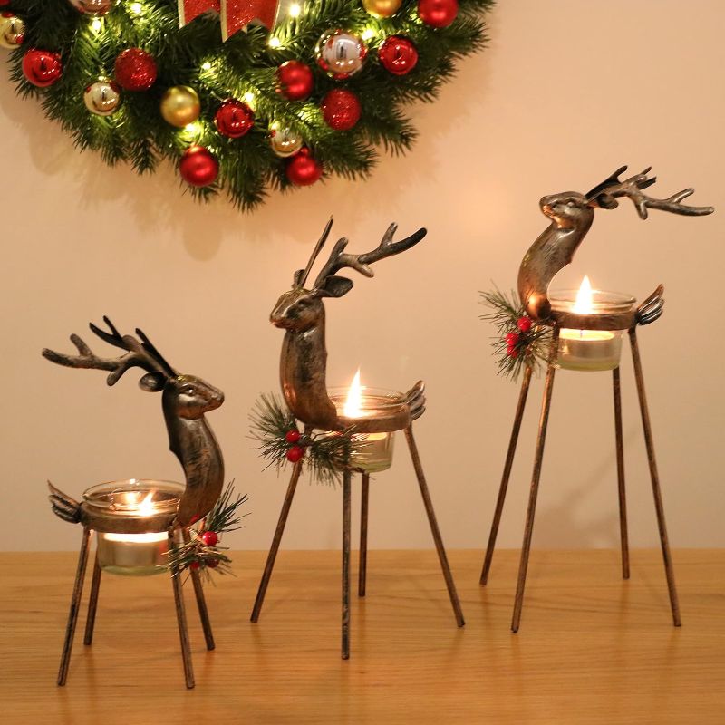 Photo 1 of Aesto 3 Pack Metal Reindeer Tea Light Candle Holders, Christmas Deer Votive Candle Holder Set for Table, Christmas Decorations 