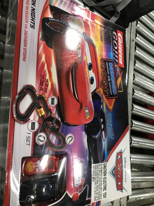 Photo 2 of Carrera GO!!! 62477 Disney Pixar Cars Neon Nights Electric Slot Car Racing Kids Toy Race Track Set Includes 2 Controllers and 2 Cars in 1:43 Scale Disney Cars Neon