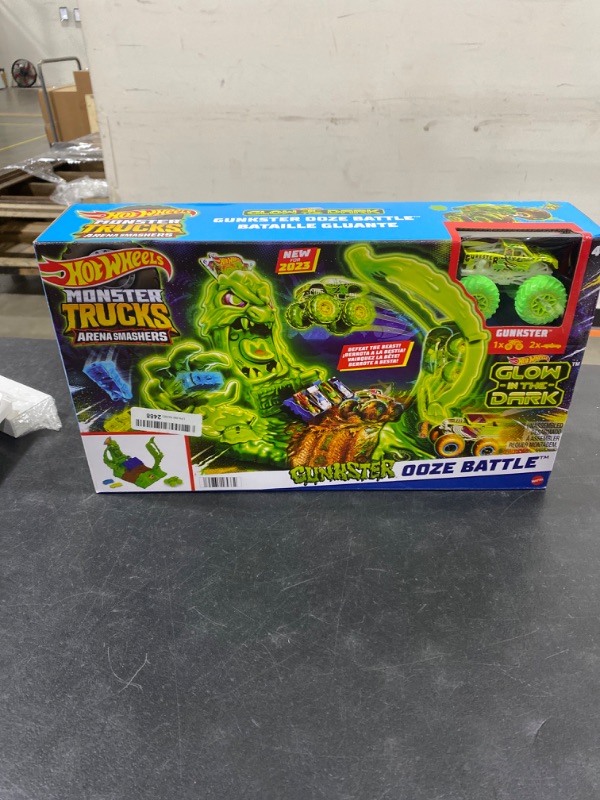 Photo 2 of Hot Wheels Monster Trucks Arena Smashers Glow-in-The-Dark Gunkster Playset with 1 Glow-in-The-Dark 1:64 Scale Gunkster Toy Truck & 2 Crushable Cars