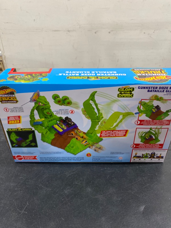 Photo 3 of Hot Wheels Monster Trucks Arena Smashers Glow-in-The-Dark Gunkster Playset with 1 Glow-in-The-Dark 1:64 Scale Gunkster Toy Truck & 2 Crushable Cars