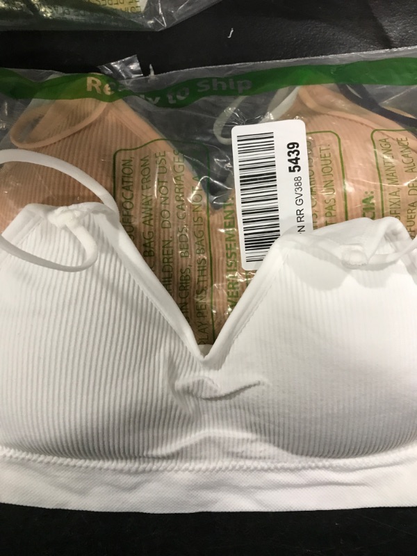 Photo 1 of 4 PACK OF BRAS
SIZE SM