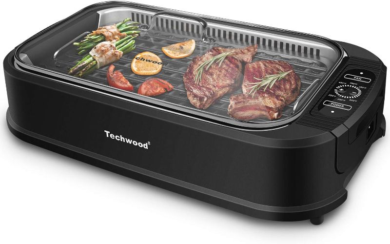 Photo 1 of Indoor Grill, Techwood 1500W Smokeless Electric Grill with Non-Stick Grill Plates, Korean Grill with Temperature Control, Tempered Glass Lid
