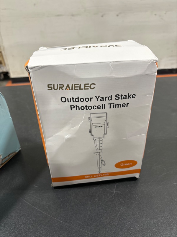 Photo 1 of SURAIELEC Outdoor Power Stake Light Timer, Dusk to Dawn, 6 Electrical Outlet Power Strip Weatherproof, 6FT Extension Cord Multiple Outlet for Patio Lights, Sprinkler, Garden, Christmas Decorations Green