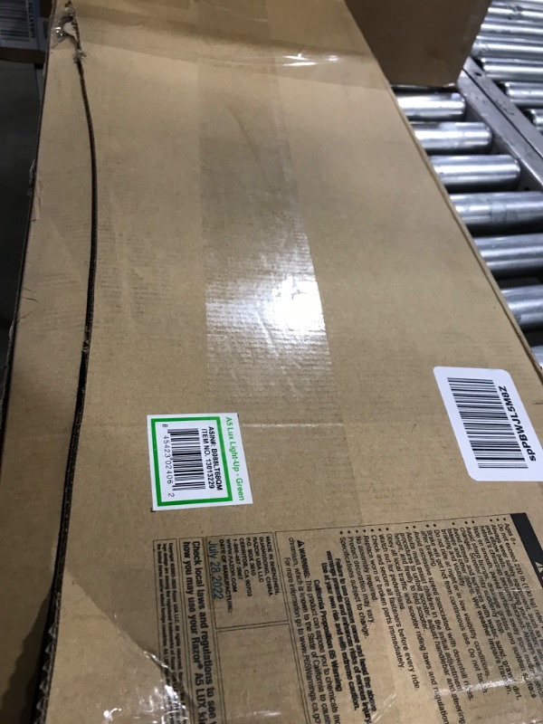 Photo 1 of Razor A5 Lux Kick Scooter - Large 8" Wheels, Foldable, Adjustable Handlebars, Lightweight, for Riders up to 220 lbs Green (New Light-Up) Standard Packaging