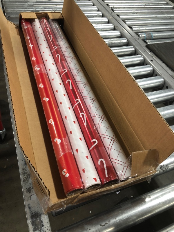 Photo 2 of American Greetings 120 sq. ft. Reversible White and Red Christmas Wrapping Paper Bundle for, Snowman, Tree, Candy Canes, Snowflakes (4 Rolls 30 in. x 12 ft.) Reversible Red and White