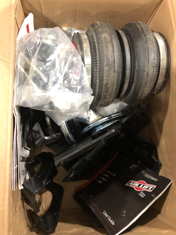 Photo 1 of Air Lift 57300 LoadLifter 5000 Air Spring Kit