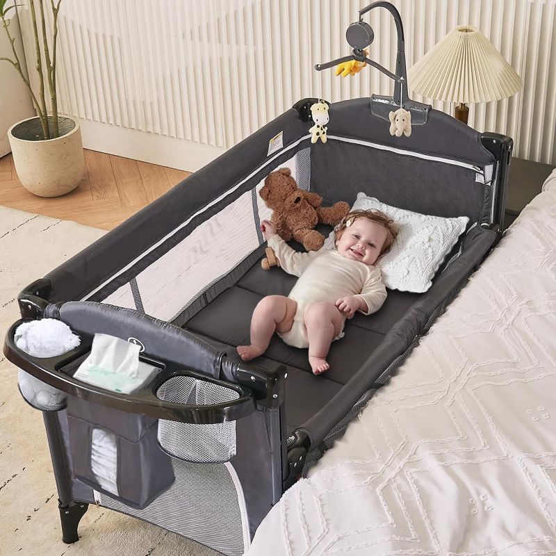 Photo 1 of 5-in-1 Baby Bedside Sleeper with Bassinet, Multifunction Pack and Play Bedside Sleeper from Newborn to Toddlers, U-Shaped Diaper Table, Music Box & Hanging Toys, Baby Playard Deluxe Nursery Center
