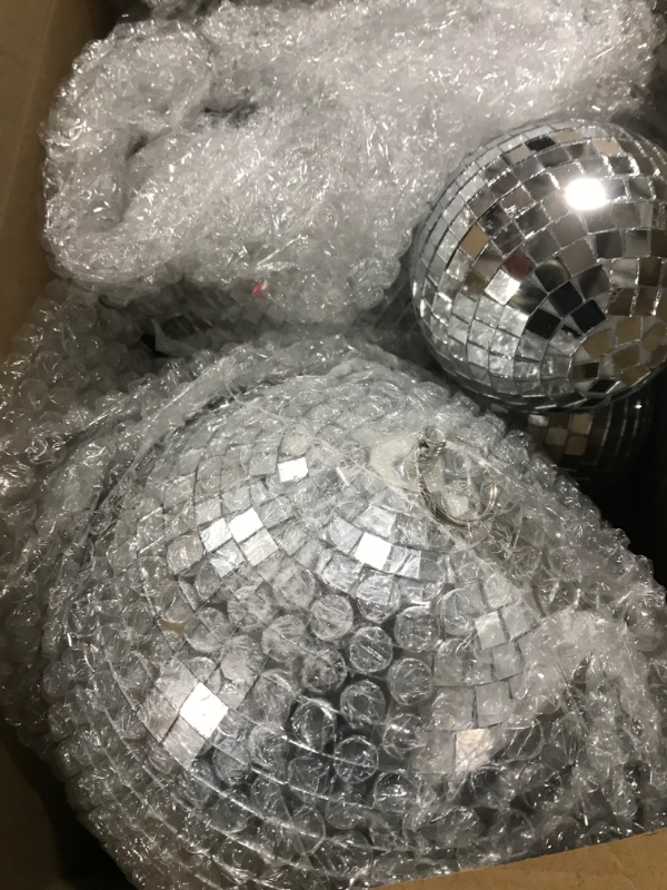 Photo 1 of 4 Pack Large Disco Ball Silver Hanging Disco Balls Reflective Mirror Ball Ornament for Party Holiday Wedding Dance and Music Festivals Decor Club Stage Props DJ Decoration (8 Inch, 6 Inch, 4 Inch)