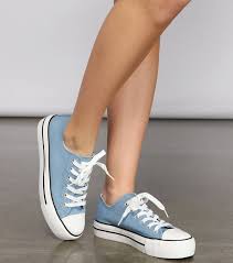 Photo 1 of (10) Light Blue Low Top Sneakers