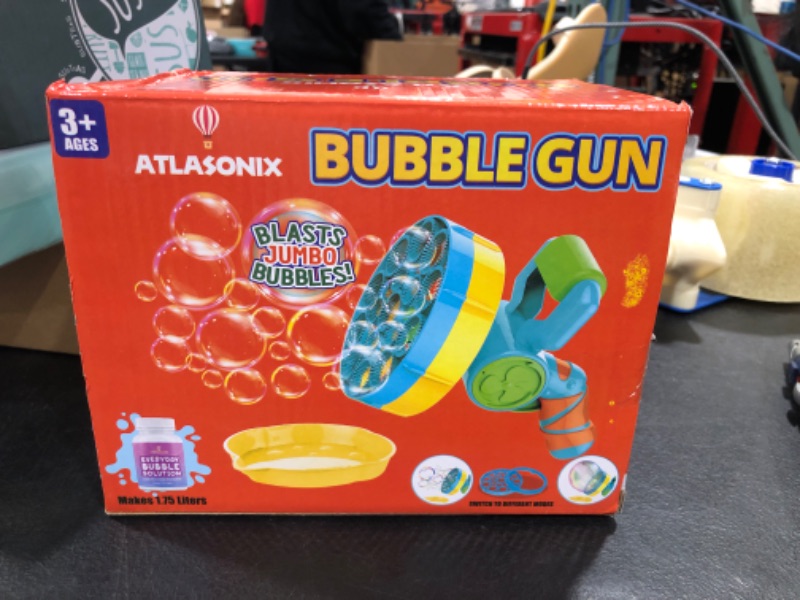 Photo 2 of Atlasonix Bubble Gun with Bubble Solution (60 oz), Bubble Blower for Kids - Bubble Guns for Toddlers, Bubble Toys, Bubble Blaster, Bubble Blaster, Bubble Blower for Toddlers