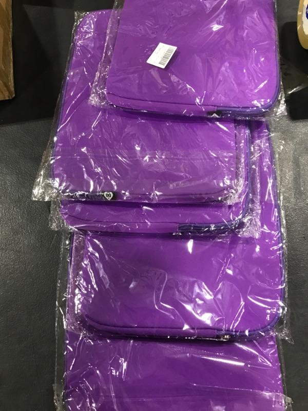 Photo 1 of PURPLE LAPTOP BAGS 