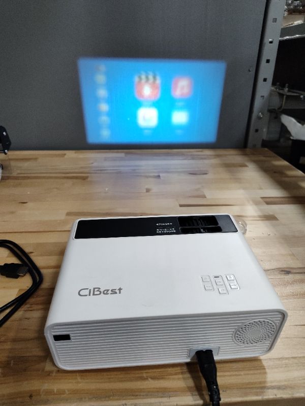 Photo 2 of Mini Projector, CiBest Native 1080P Projector Outdoor, 2023 Upgraded 9500L Full HD Portable Projector, Small Home Movie Projector 200" Supported, Compatible with PS4, PC via HDMI, VGA, AV, and USB