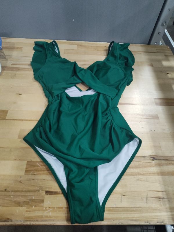 Photo 1 of GREEN 1 PIECE SWIMSUIT MEDIUM