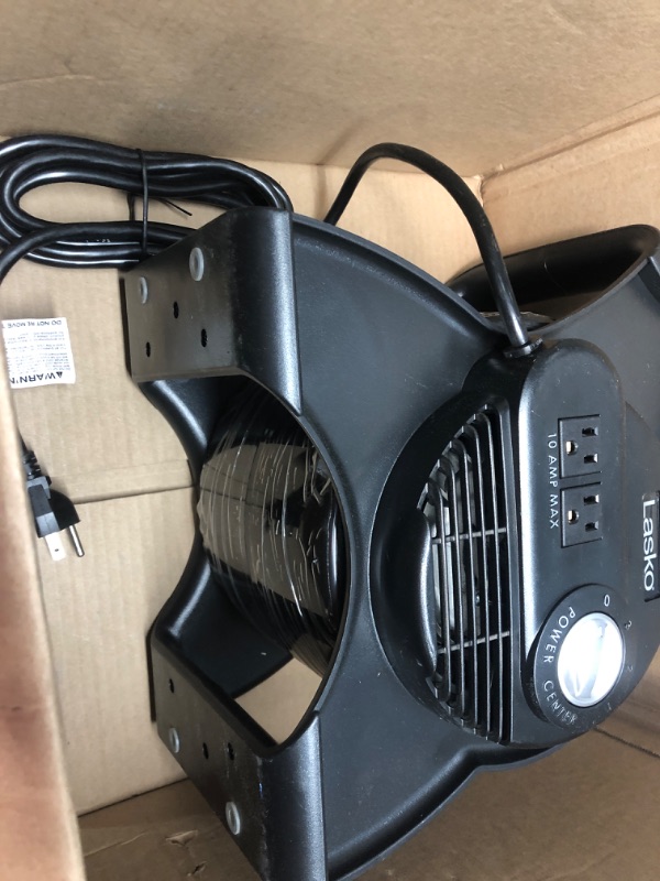 Photo 2 of Lasko 12” Utility Fan for Job Site or Home Use, 289 CFM, Pivoting High Velocity Blower Fans, 3 Speeds, 2 Accessory Outlets 120V, Black, U12104