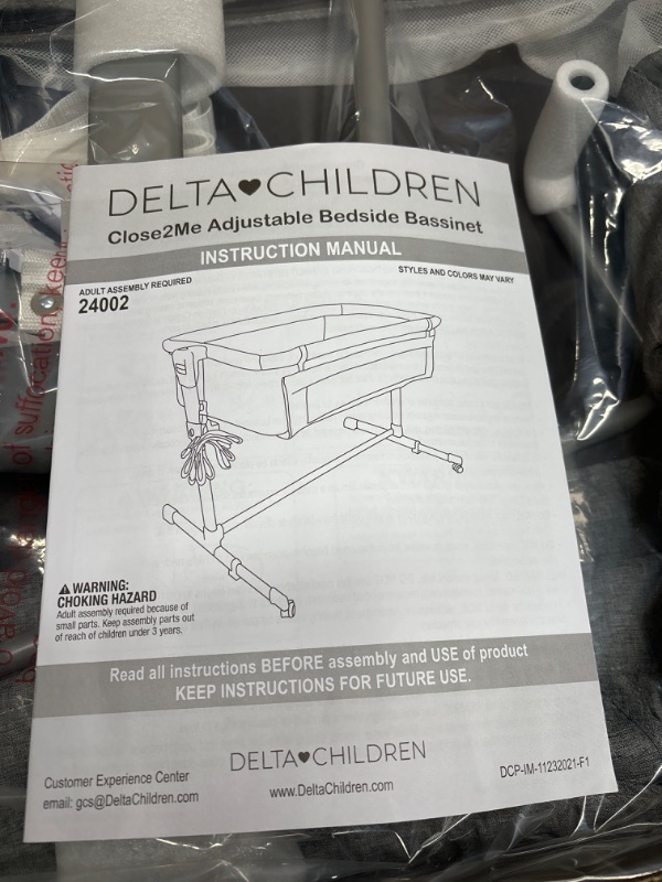 Photo 1 of Delta Children Close2Me Bedside Baby Bassinet Sleeper with Breathable Mesh and Adjustable Heights - Lightweight Portable Crib, Grey