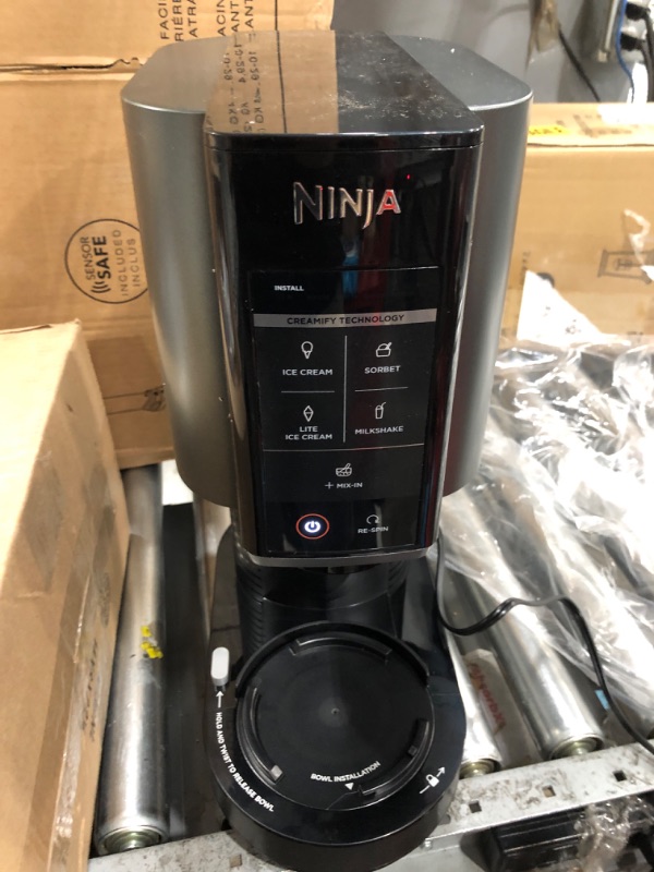 Photo 2 of Ninja NC300 CREAMi Ice Cream Maker, for Gelato, Mix-ins, Milkshakes, Sorbet, Smoothie Bowls & More, 5 One-Touch Programs, with (2) Pint Containers & Lids, Compact Size, Perfect for Kids, Silver (Renewed)