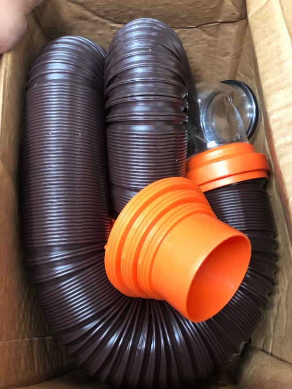 Photo 2 of Camco RhinoFLEX RV Sewer Hose Kit with Swivel Transparent Elbow and 4-in-1 Dump Station Fitting, Brown, 15 Feet (39770) 15ft Sewer Hose Kit Frustration-Free Packaging