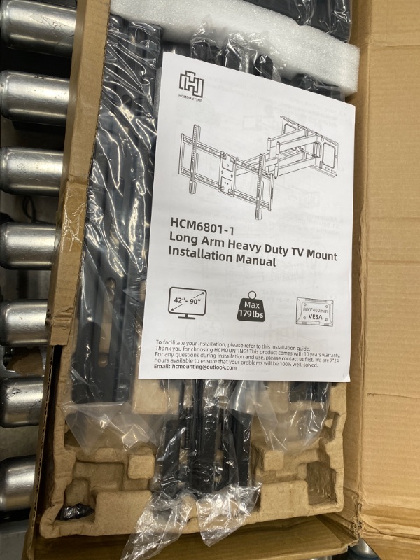 Photo 2 of HCMOUNTING Heavy Duty Long Dual Arm TV Wall Mount Holds up to 179 lbs, Swivel and Tilt TV Mount with 40.9" Extended Articulating Arms for Most 42-90 inch TVs, VESA 800x400mm, Fits 16''-18'' Wood Studs