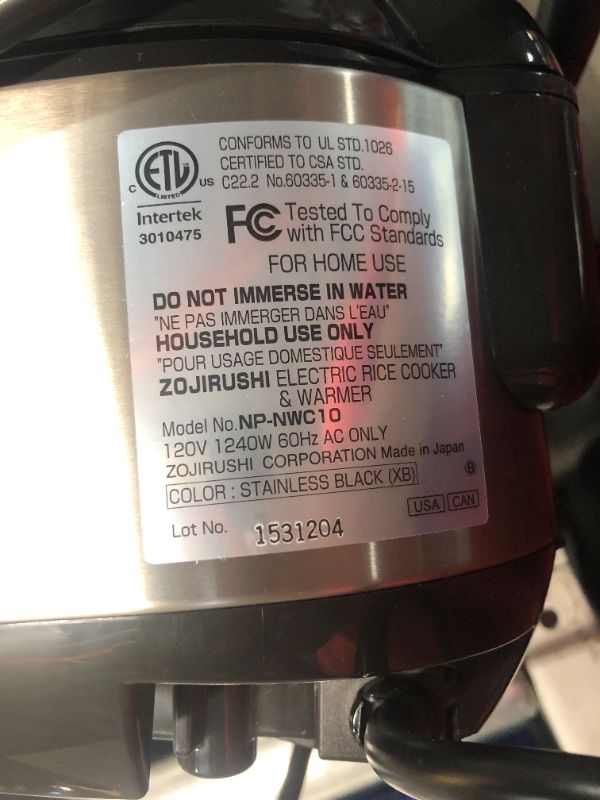 Photo 4 of ***USED - MISSING SPOON - POWERS ON - UNABLE TO TEST FURTHER***
Zojirushi NP-NWC10XB Pressure Induction Heating Rice Cooker & Warmer, 5.5 Cup, Stainless Black, Made in Japan