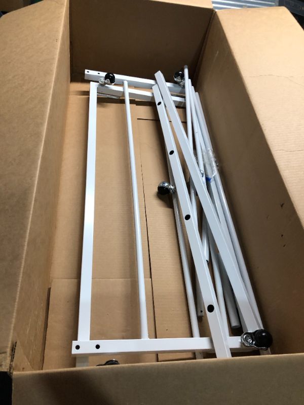 Photo 3 of ***USED - LIKELY MISSING PARTS - NO INSTRUCTIONS - SCRATCHED AND SCUFFED - UNABLE TO VERIFY FUNCTIONALITY***
Kings Brand Furniture - Metal Twin Size Roll-Out Trundle Bed Frame with Slats Support, Cream White Cream White Finish