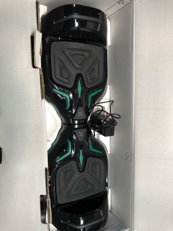 Photo 2 of Hover-1 Superfly Electric Hoverboard, 7MPH Top Speed, 6 Mile Range, Long Lasting Li-Ion Battery, 5HR Full Charge, Built-In Bluetooth Speaker, Rider Modes: Beginner to Expert, Black