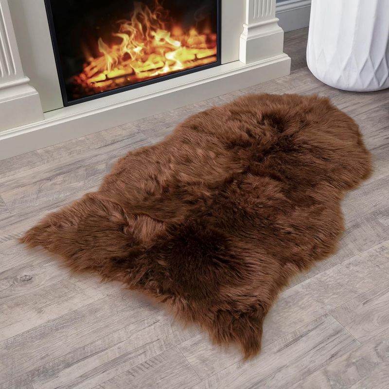 Photo 1 of small sheepskin rug brown 