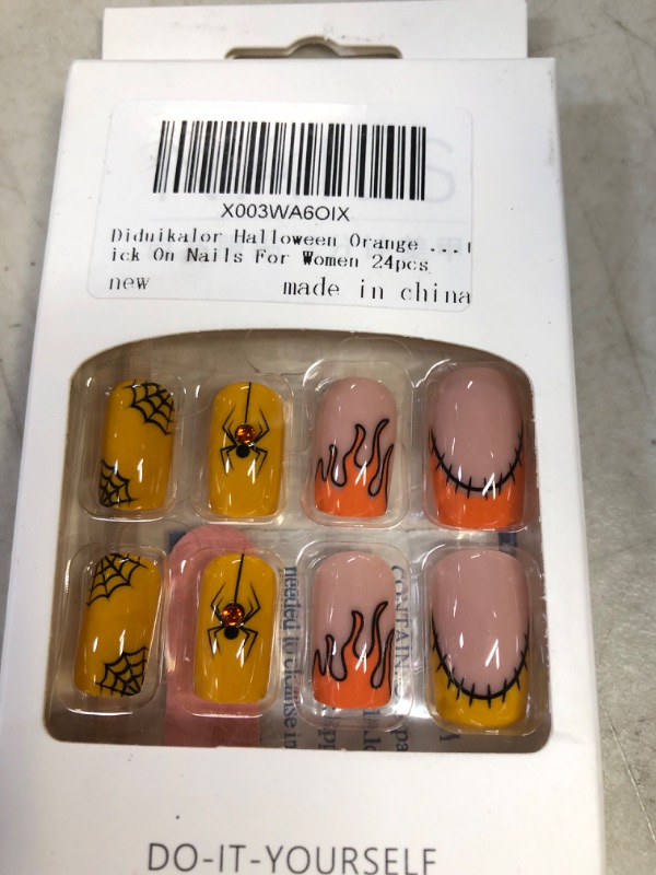 Photo 1 of Diduikalor Halloween Orange Medium Press On Nails  Coffin Fake Nails  Flame And Spider Design False Nails Acrylic Glue On Nails Reusable Stick On Nails For Women 24pcs