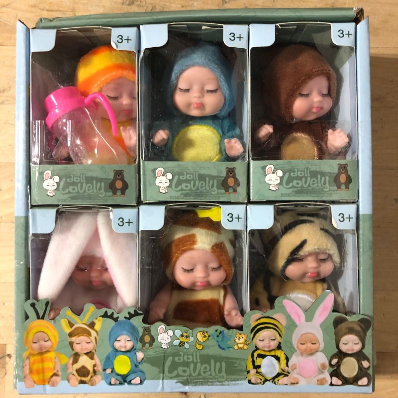 Photo 2 of Reborn Baby Dolls 6-Piece Mini Doll Set for Children Washable PVC Material Lifelike Realistic Baby Dolls Toy with Cute Clothes and Hats Perfect for Young Boys and Girls*****Factory Sealed