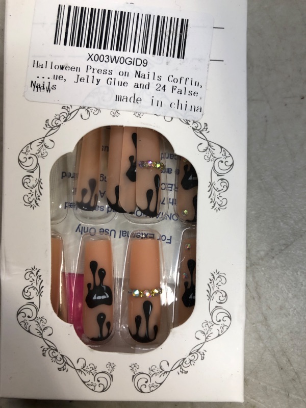 Photo 1 of Halloween Press on Nails Coffin, Long Fake Nails with Black Bloody Spider Web Pattern, Glue on nails for Women Girls DIY Nail Manicure, Includes Prep Pad, Mini File, Cuticle Stick, Glue, Jelly Glue and 24 False Nails