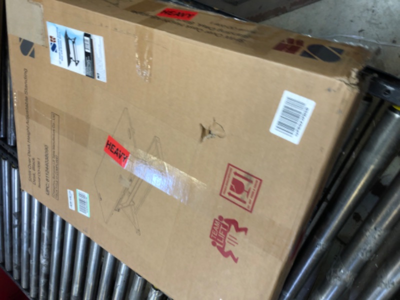 Photo 1 of SHW 32-Inch Height Adjustable Standing Desk Converter Riser Workstation, Black