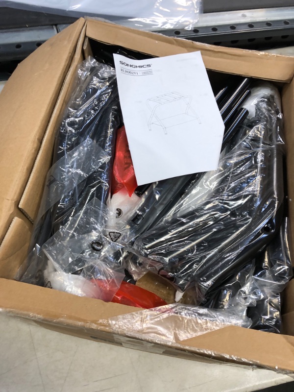 Photo 1 of SONGMICS Luggage Rack, Suitcase Stand with Fabric Storage Shelf, for Guest Room, Bedroom, Hotel, Foldable Steel Frame, Holds up to 110 lb, 27.2 x 15 x 20.5 Inches, Black URLR002B01V1