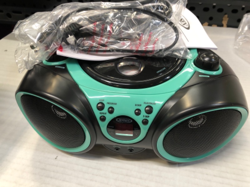 Photo 2 of Jensen CD-490 Portable Sport Stereo CD Player Boombox with AM/FM Radio, Aux Line-in & Headphone Jack (Limited Edition Colors) (Aqua Teal)