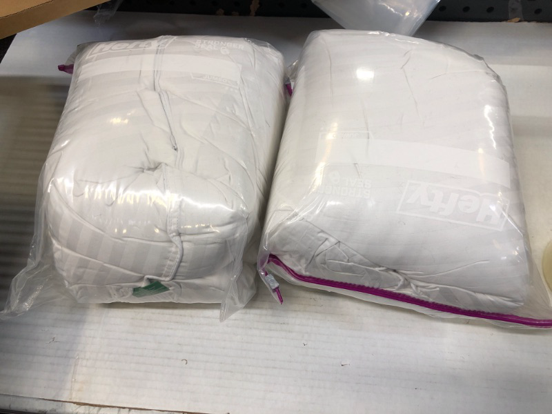 Photo 1 of 2 White pillows 