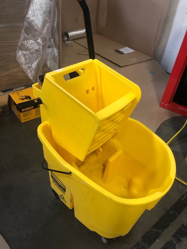Photo 1 of Rubbermaid Commercial Products WaveBrake 35 Qt. Side-Press Mop Bucket and Wringer Combo on Wheels, Yellow, for Professional/Industrial/Business Heavy-Duty Floor Cleaning/Mopping
