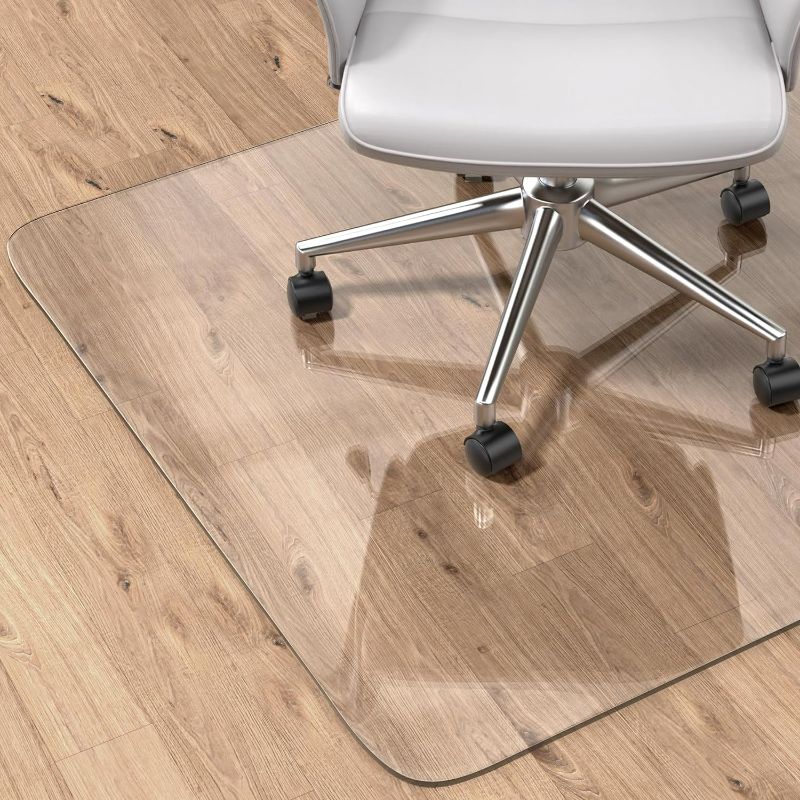 Photo 1 of Office Chair Mat for Hardwood Floor, 59"×47" Large Desk Chair Mat for Rolling Chairs, 2mm Heavy Duty Floor Protector Mat for Home Office, Easy Glide, Flat Without Curling