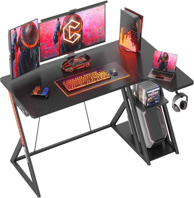 Photo 1 of CubiCubi Aurora Gaming Desk with Carbon Fiber Surface, 40 Inch L Shaped Desk with Storage Shelves, Small Corner Computer Desk with Monitor Shelf, Gamer Desk PC Table, Black
