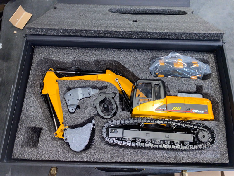 Photo 3 of Top Race 23 Channel Hobby Remote Control Excavator, V4, Construction Vehicle RC Tractor, Full Metal Excavator Toy, Carries 180 Lbs, Diggs 1.1 Lbs Per Cubic Inch, Real Smoke, Use With our RC Dump Truck TR-211M