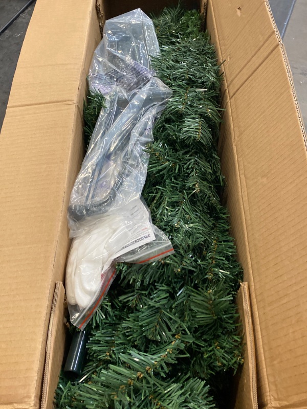 Photo 2 of 6.5ft Spruce Artificial Festive Christmas Tree for Home, Office, and Party Decor with 750 Branch Tips, Simple Setup, Metal Hinges, and Collapsible Base
