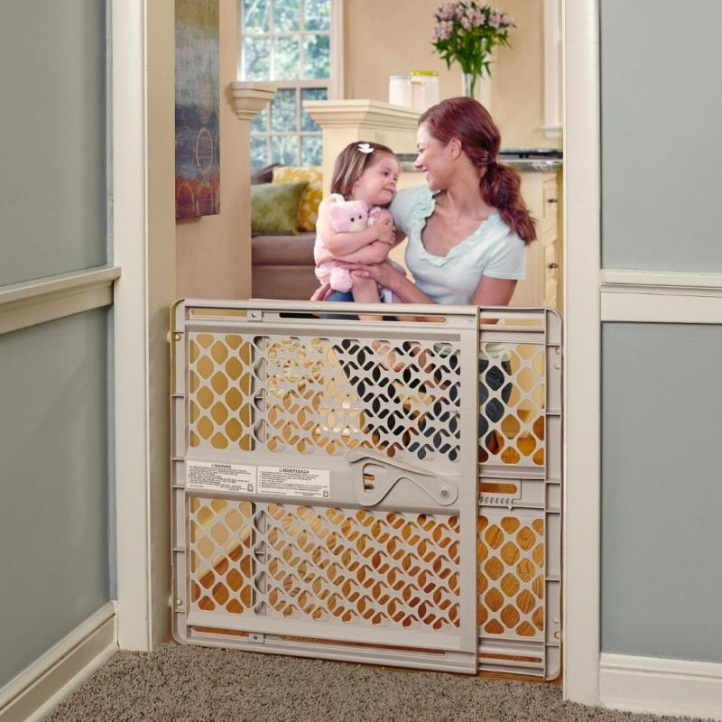 Photo 1 of Toddleroo by North States Supergate Ergo Child Gate, Baby Gate for Stairs and Doorways. Includes Wall Cups. Pressure or Hardware Mount. Made in USA. (26" Tall, Sand)
