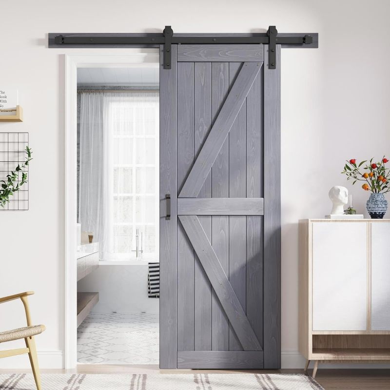 Photo 1 of 32in x 84in Gray Wood Barn Door Slab with 5.5ft (66inch) Barn Door Hardware Track Kit and Handle Floor Guide Included, Double Surfaces,Simple Assembly is Required,K-Frame,Grey
