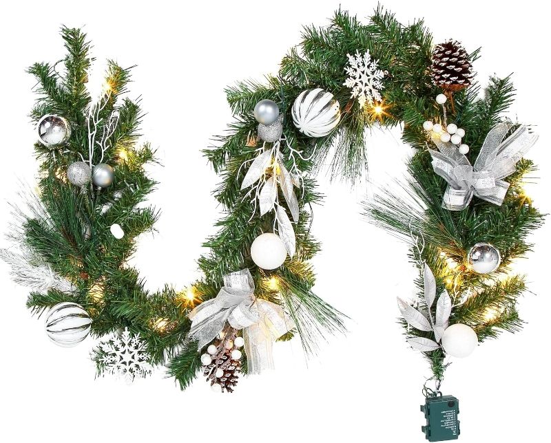 Photo 1 of 6ft Christmas Garland with Lights, Silver White Christmas Garland with Bow Ball Ornaments Snowflakes Pine Cone Battery Operated Christmas Decoration for Mantle Fireplace Staircase
