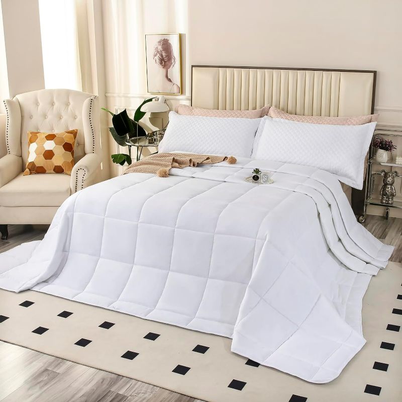 Photo 1 of Oversized King Plus Comforter, Winter Warm 128x120 Extra Large King Size Quilts 3 Pieces, Lightweight Reversible All Season Down Alternative Duvet Insert Comforter with 8 Corner Tabs -White

