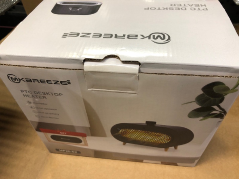 Photo 1 of MKBREEZE Space Heater with Humidifier Function, PTC Ceramic Heater with 4 Modes, with Detachable Hand Warmer for Home/Office