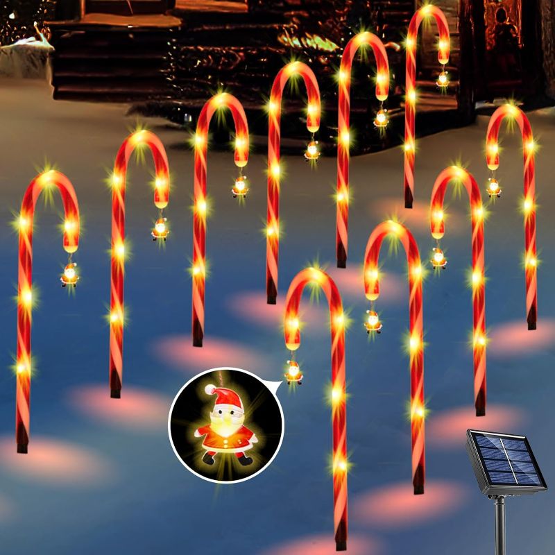 Photo 1 of 10 Pack Candy Cane Lights Solar Christmas Decorations Outdoor Led Pathway Markers Lights with Santa Claus for Walkway Driveway Lawn Yard Garden Home Indoor Xmas Decor 2-in-1 Rechargeable Solar Power