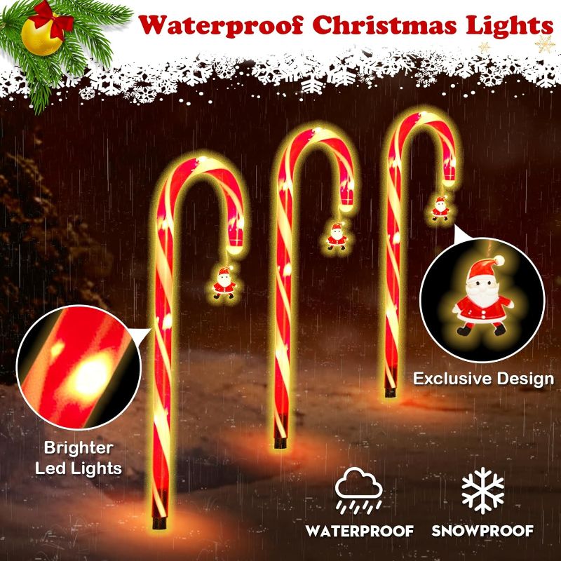 Photo 1 of 10 Pack Candy Cane Lights Solar Christmas Decorations Outdoor Led Pathway Markers Lights with Santa Claus for Walkway Driveway Lawn Yard Garden Home Indoor Xmas Decor 2-in-1 Rechargeable Solar Power