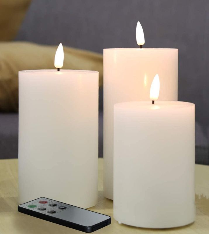 Photo 1 of Eywamage White Flat Top Flameless Candles with Remote, Flickering Real Wax LED Battery Candles D 3" H 4" 5" 6", 3 Pack
