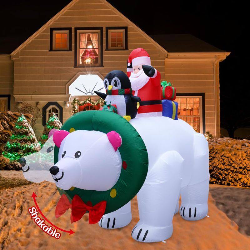 Photo 1 of Lumiwind 7.7FT Christmas Inflatable Santa Claus Riding Polar Bears with Shaking Head Outdoor Blow Up Yard Decoration with Built-in LED Lights Xmas Party Indoor Outdoor Décor for Lawn Garden Holiday
