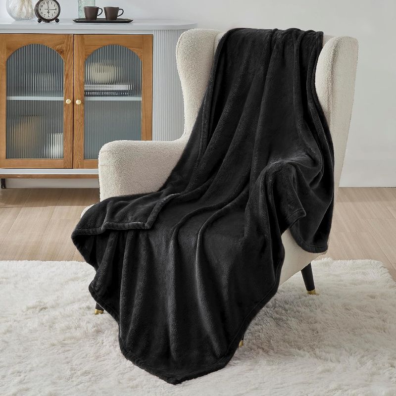 Photo 1 of Bedsure Black Fleece Blanket 50x70 Blanket - 300GSM Soft Lightweight Plush Cozy Blankets for Bed, Sofa, Couch, Travel, Camping
